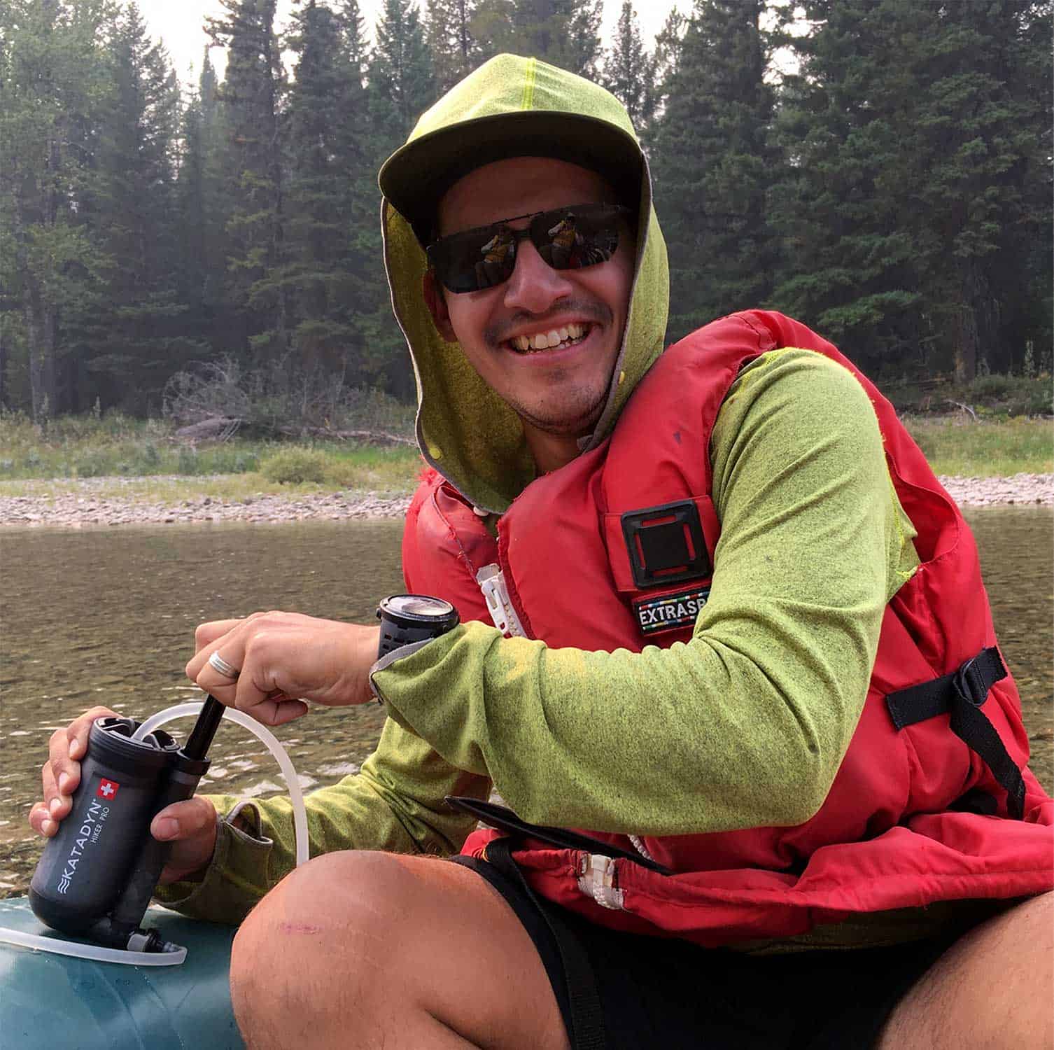 Katadyn Hiker Pro pumping water from a river
