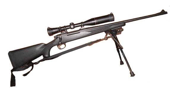 A Remington 700 bolt‑action rifle with a black synthetic stock, mounted scope, and bipod, positioned horizontally and resting on its bipod.